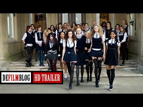 Trailer frame — the St. Trinian’s bandstand moment sets up the theme song payoff