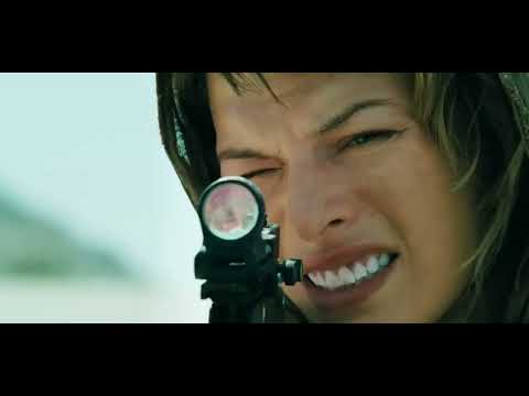 Resident Evil: Extinction 2007 trailer still—Alice strides through the Nevada desert toward a ruined Vegas