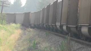 preview picture of video 'Notch Hill-7-Third empty eastbound coal train, Notch Hill at sprayer, July 31 2010'