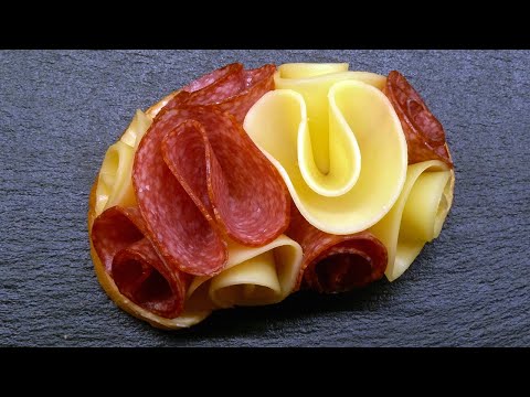 Shaping of salami, ham, cheese – open sandwiches and canapés.