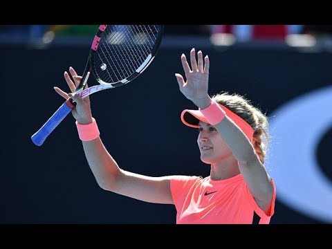 Bouchard finds form as she beats Dodin at Australian Open