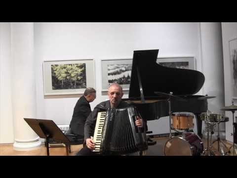 Hugo Goldenzweig and William Schimmel perform Albeniz Iberia