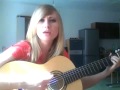 Beautiful girl playing the guitar and sings 