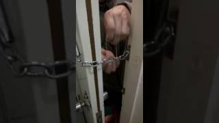 How to open chain door lock from outside