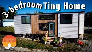 Living her best life in stunning Tiny House with 3 standing bedrooms!