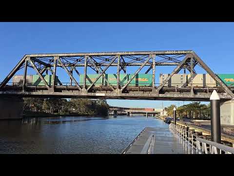 Pacific National NR63 NR102 5SM2 train crossing the Maribyrnong River Bridge