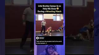 During a wrestling match, a hero steps in
