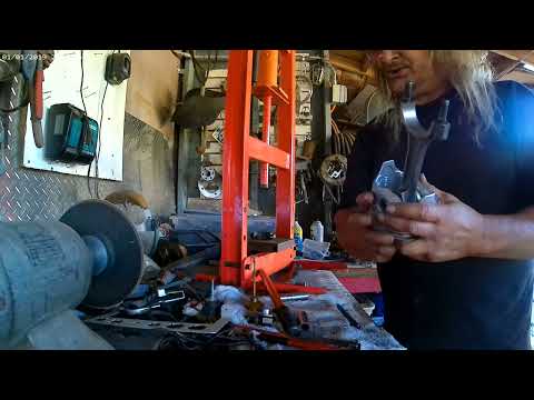 Press in the wrist pins on your pistons