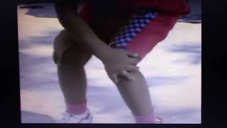 Sesame Street -- A little Girl holding onto her Knees