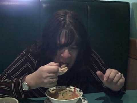 Joyce eating Tom Yum Thai Soup