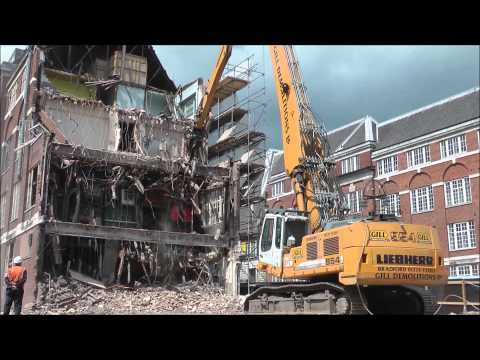 Big long reach Liebherr demolition excavator working.