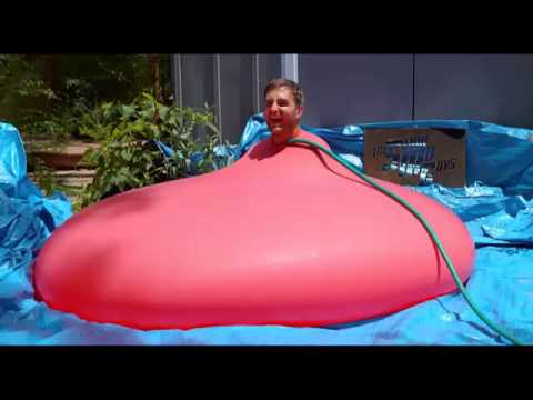 6ft Man in 6ft Giant Water Balloon - 4K - The Slow Mo Guys