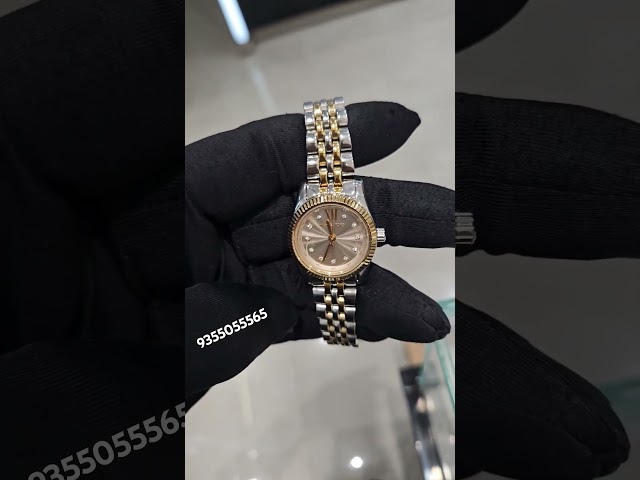 Vídeo relacionado con Michael Kors - Reloj Lexington cronógrafo de Cuarzo con Correa de Acero Inoxidable en Tonos Plateados y Dorados para Mujer MK5735
