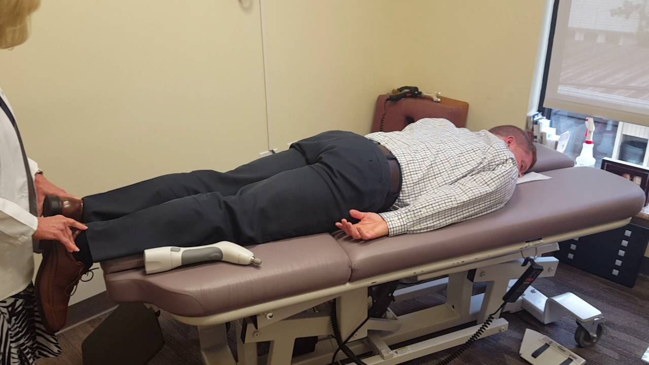 Houston Holistic Doctors Activator Method Chiropractic Adjustment Demonstration