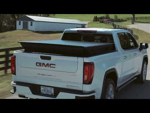 RaZorTop a roll-up tonneau cover to a full-sized cap #754-205-4575