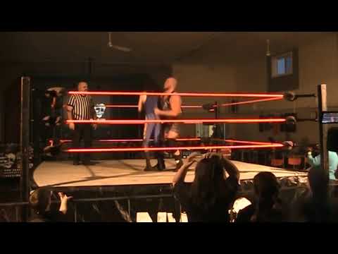 Charlie Winston choke slams Kid Legacy