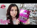 BRATZ X REVOLUTION LIP VAULT REVIEW AND LIP SWATCHES VLOGMAS DAY 8 LIZZIE DEMETRIOU