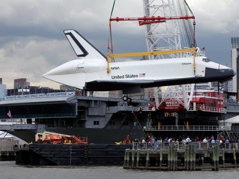 CBS Evening News with Scott Pelley - Space shuttle Enterprise lands on NY aircraft carrier