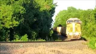 preview picture of video 'Union Pacific C44AC no. 6553 and AC4460CW no. 7077 lead an empty coal train west of Atchison, Kansas'