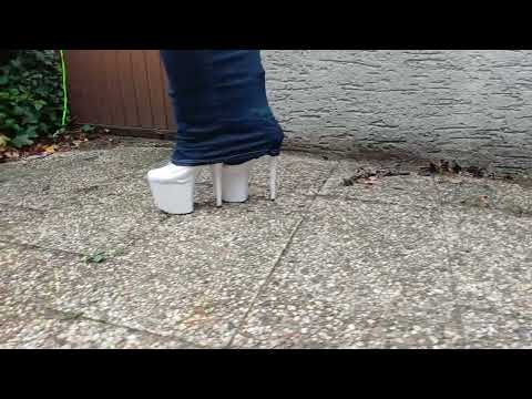 Mr #HighHeels tries the denim #Hobble #skirt with the new white #boots