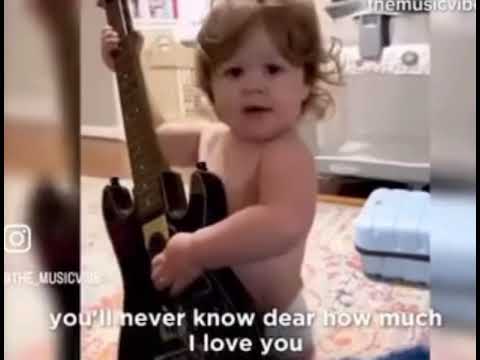 Baby singing “You Are My Sunshine”.
