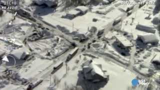 Aerial footage shows Buffalo buried by snow walls