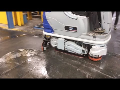 Biosativa Bio Cleaner cleans an oily industrial floor