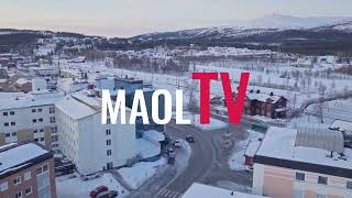 Centrum med snötäckta berg