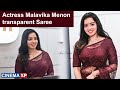 Malayalam Actress Malavika Menon Stills In Transparent Purple Saree