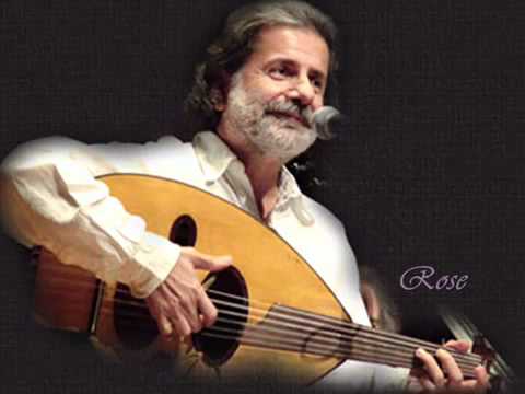 YouTube - أحن الى خبز أمى _ مارسيل خليفه على العود.