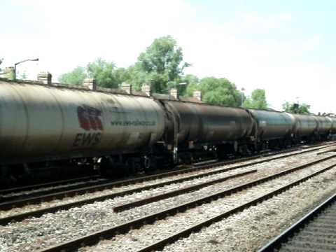 DB Schenker Class 66 66163 Passing Oxford Working A Tank Train