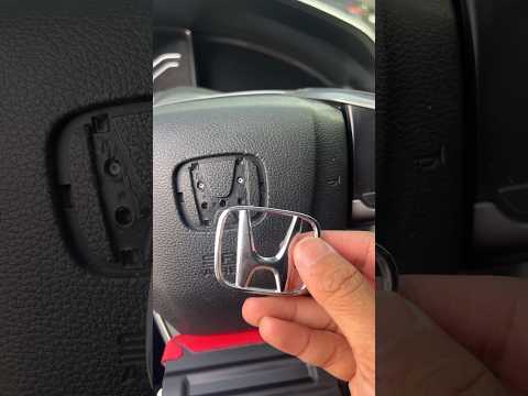 How to remove Honda Civic emblem on steering wheel?