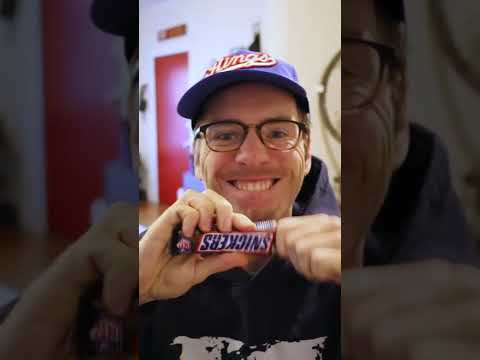 Opening a Snickers bar like they do in commercials