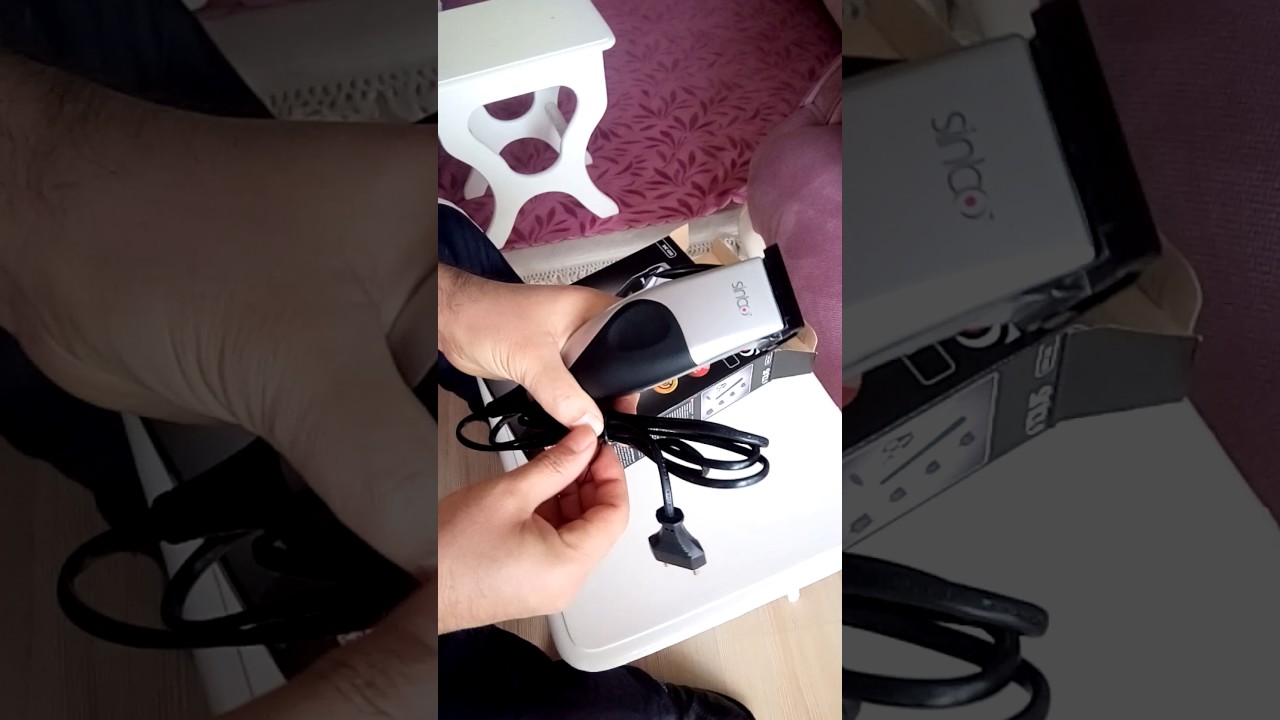 Машинка для стрижки Sinbo SHC 4350 серебристый/черный (насадок в компл:4шт)