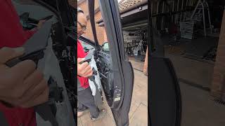 How to remove the Fisker Ocean Front door panel to gain access to the door handle.