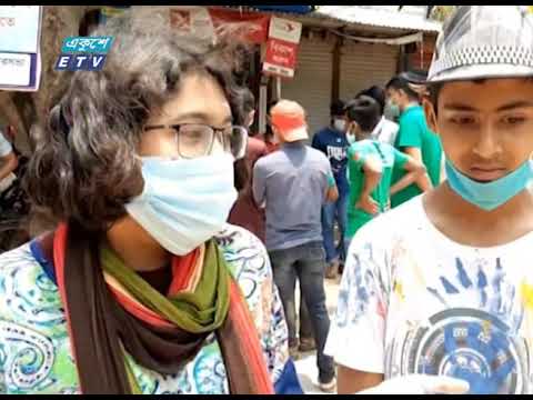 পাবনায় সড়কে আল্পনা এঁকে ছড়িয়ে দেয়া হচ্ছে করোনা সচেতনতার বার্তা