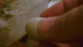 Triboluminescence in Quartz Crystal