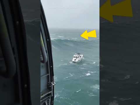Terrifying moment Rogue wave capsizes boat during a rescue mission