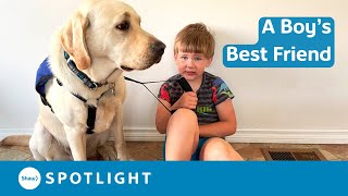 A Mother Supports her Autistic Son with a Service Dog