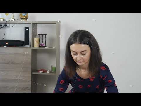 Female masseur massage womans's face