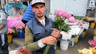 colombian man selling flowers on the street in colombia