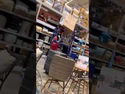 Lowe's employee screaming, freaking out on a lift machine.