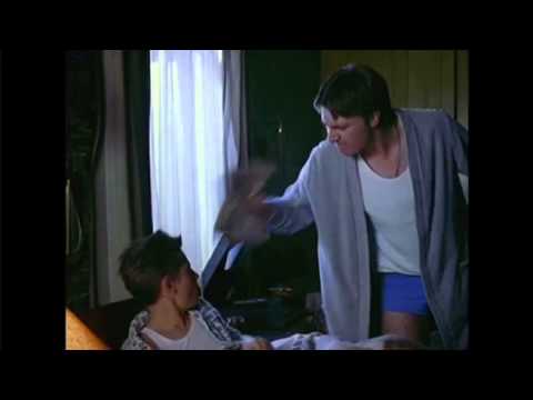 Trailer frame: Billy peers from boxing ring toward ballet class door