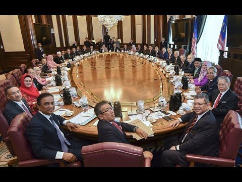 Back in power, Umno’s suits against 9 defectors in limbo?