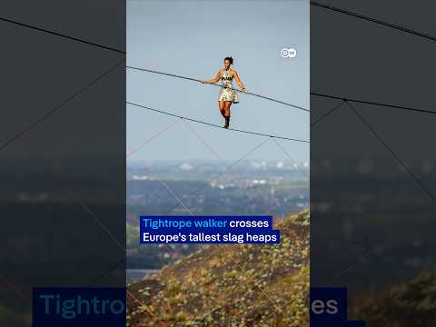 Tightrope walker connects Europe's tallest slag heaps | DW News