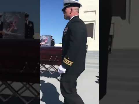 Jocko Willink pounds his SEAL Trident into Cmdr Seth Stone’s Casket