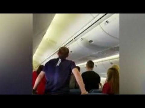 High school choir honors WWII soldier during flight