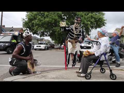 North Side Skull and Bones Gang serenades with drums at Downtown Super Sunday in New Orleans