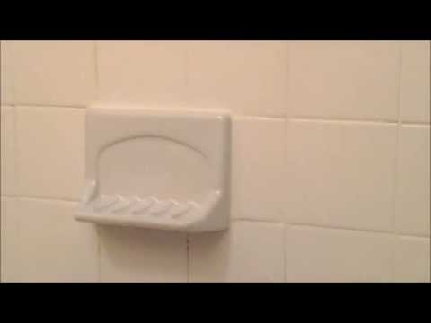 Part of a video titled How To Install A Ceramic Soap Dish. - YouTube