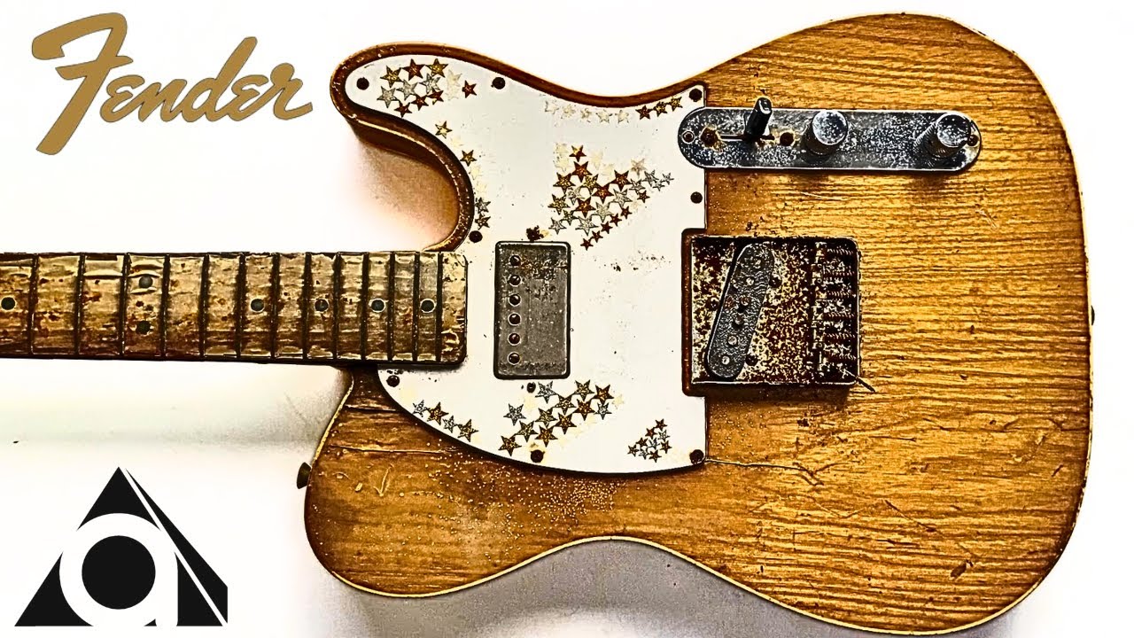 I repaired a rusty guitar with rotting wood.